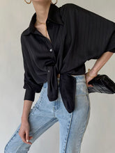 European and American 2026 autumn women's fashion temperament commuting style solid color striped satin design sense niche fashionable top