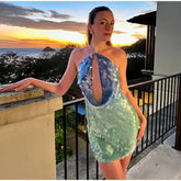 European and American 2026 new cross-border women's sexy backless sequined spicy girl short skirt vacation hanging neck temperament dress